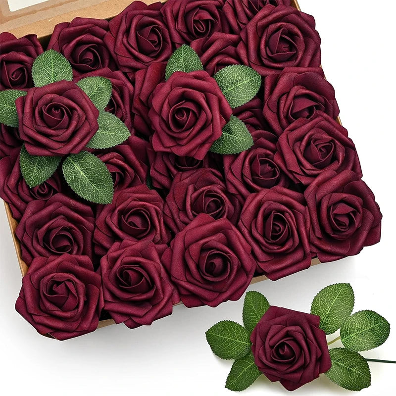 A box filled with deep burgundy foam rose flowers and stems for DIY bouquets and home decor.