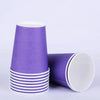 A stack of purple disposable cups with white rims, shown in a studio setting.