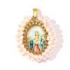 Gold-toned pendant featuring a miniature oval cameo of the Virgin Mary surrounded by pink beads.