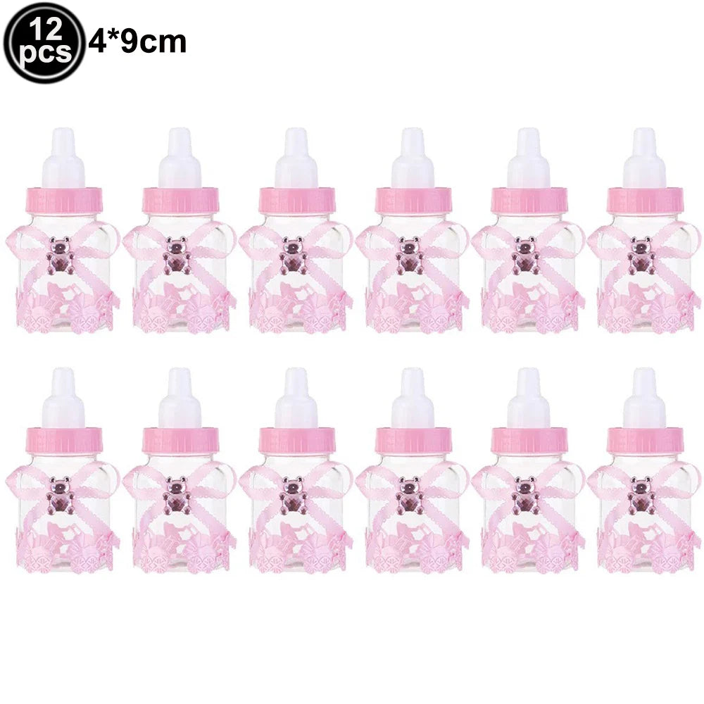 Twelve pink aluminum foil baby bottle balloons with purple caps for baby shower decor
