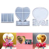 A set of heart-shaped silicone molds for creating DIY photo frames and decorative elements.