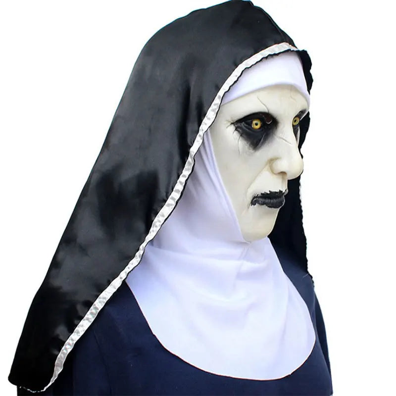 A scary nun latex mask with a black headscarf and white collar.