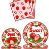 A set of pink and red strawberry themed disposable birthday party tableware including plates and napkins.
