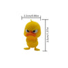 A yellow 3D printed statue of an angry duck with orange beak and eyes.