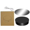 A set of 360° rotating display stands for jewelry and items, including a mirror, a black base, and a power cord.