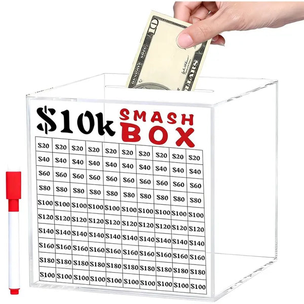 Clear acrylic smash piggy bank box for a $10K savings challenge with cash inside