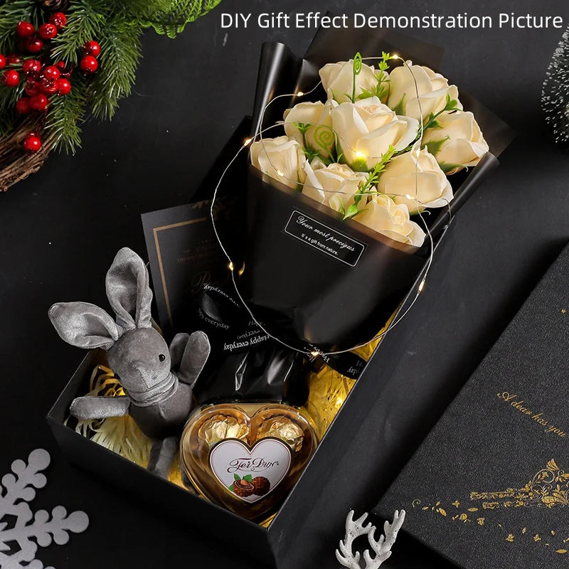 A demonstration picture showing a handcrafted soap rose bouquet inside a black box with a decorative rabbit figure.