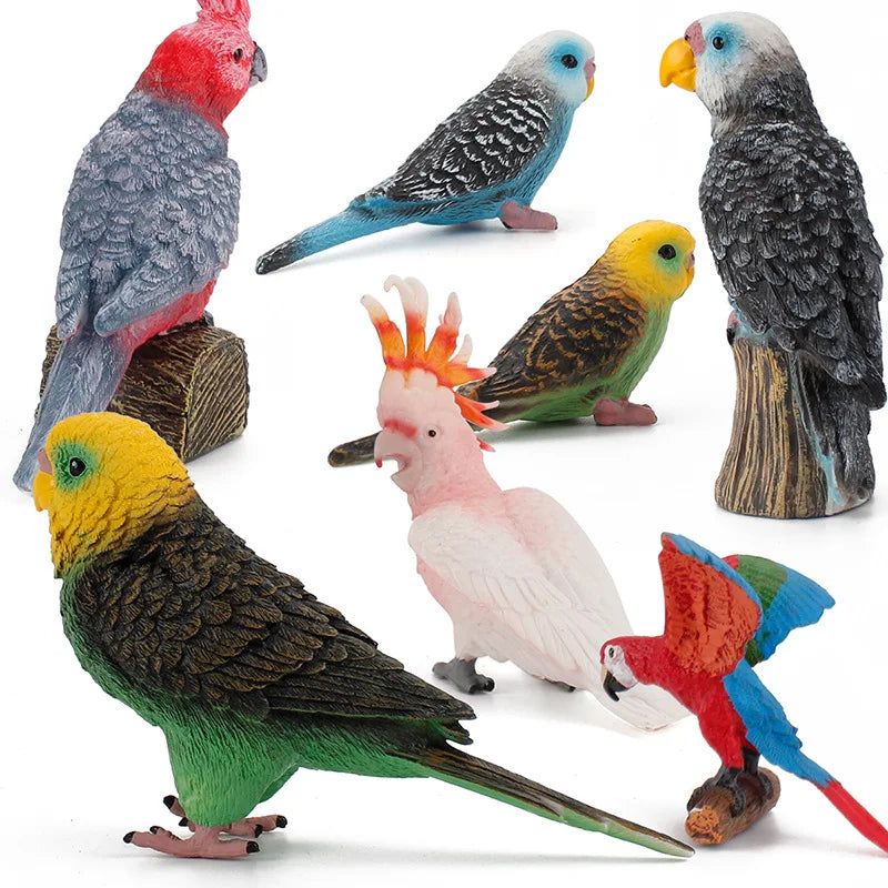 A collection of hand-painted resin parrot figurines in various colors and species.