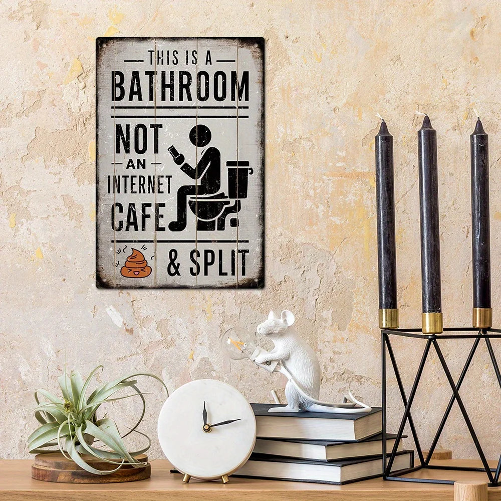 A vintage metal tin sign with text on a wooden plank hangs on a textured wall next to a white clock and books.