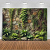 A lush green tropical palm leaf backdrop featuring mossy stone walls and various foliage for party decor.