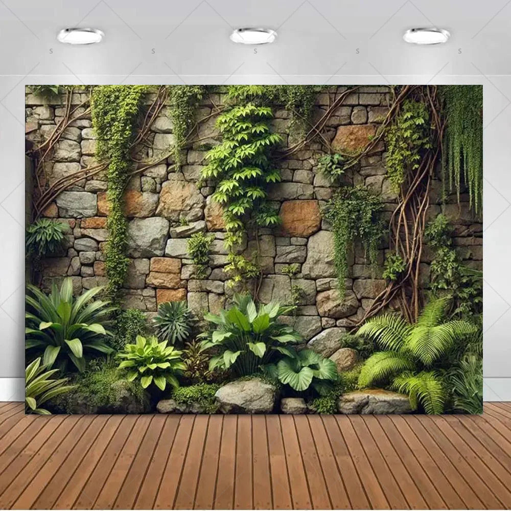 A lush green tropical palm leaf backdrop featuring mossy stone walls and various foliage for party decor.