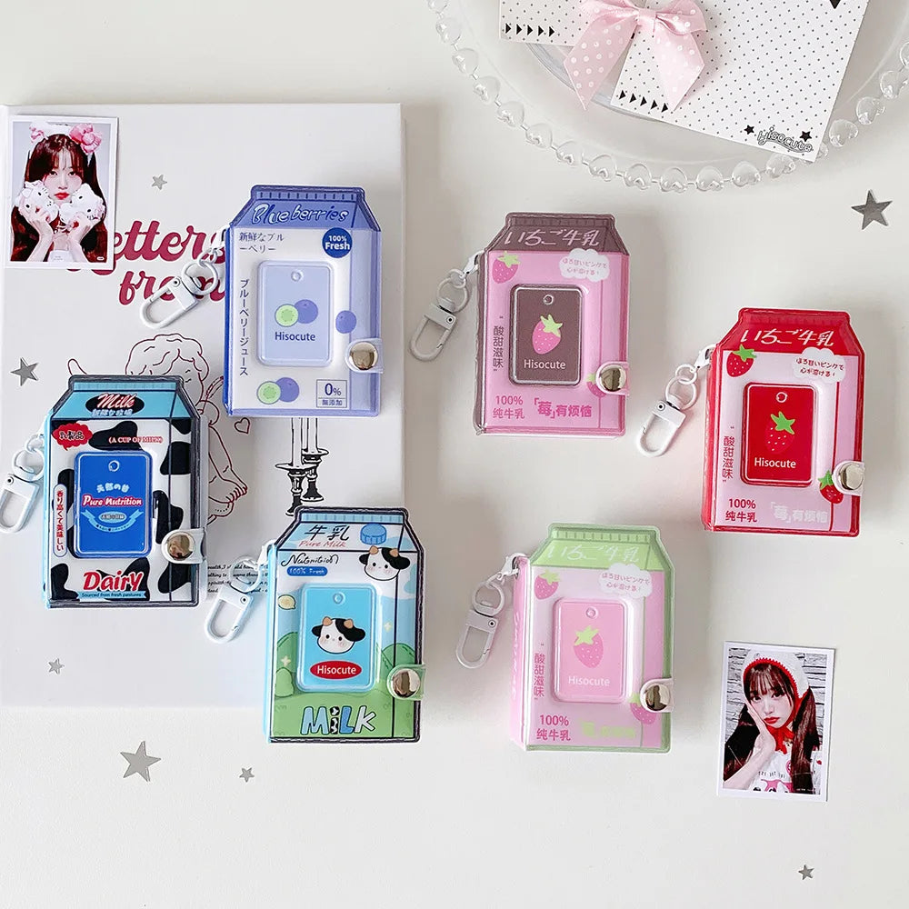 A collection of pink and green silicone photo keychains shaped like milk bottles, featuring various cartoon designs.