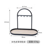 Black leather and wrought iron desk organizer rack with dimensions 16.7cm by 25.5cm and a depth of 30cm