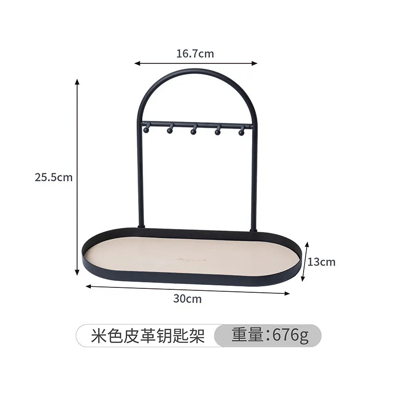 Black leather and wrought iron desk organizer rack with dimensions 16.7cm by 25.5cm and a depth of 30cm