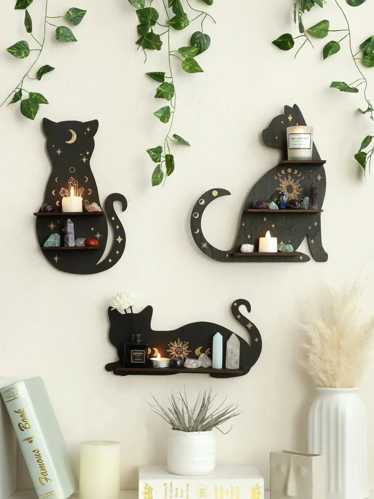 A black cat wall shelf featuring a gothic moon phase design with candles and decorative elements.