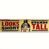 Vintage metal sign with distressed text that reads Looks Short Stands Tall and features a bottle of Coors Golden beer.