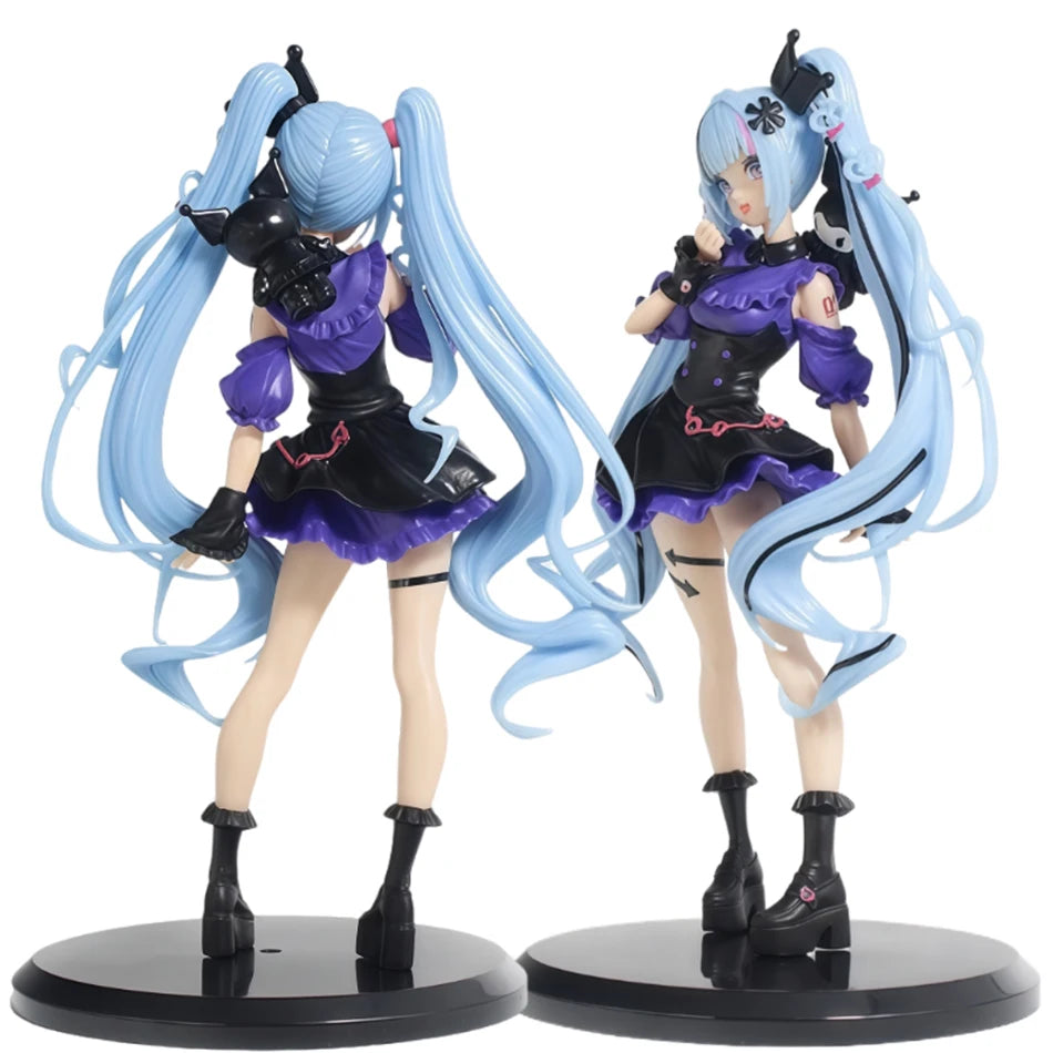 A pair of Gothic Lolita Miku action fairy dolls with light blue hair and black and purple outfits.