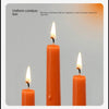 A set of uniform orange taper candles burning smokeless for long burn time.