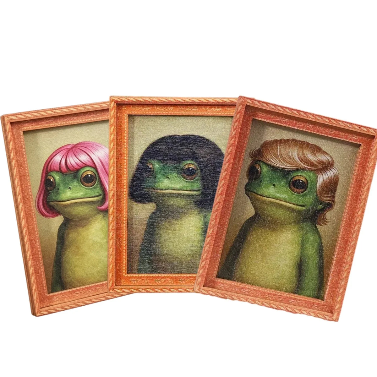 A set of three wooden photo frames featuring watercolor illustrations of frogs.