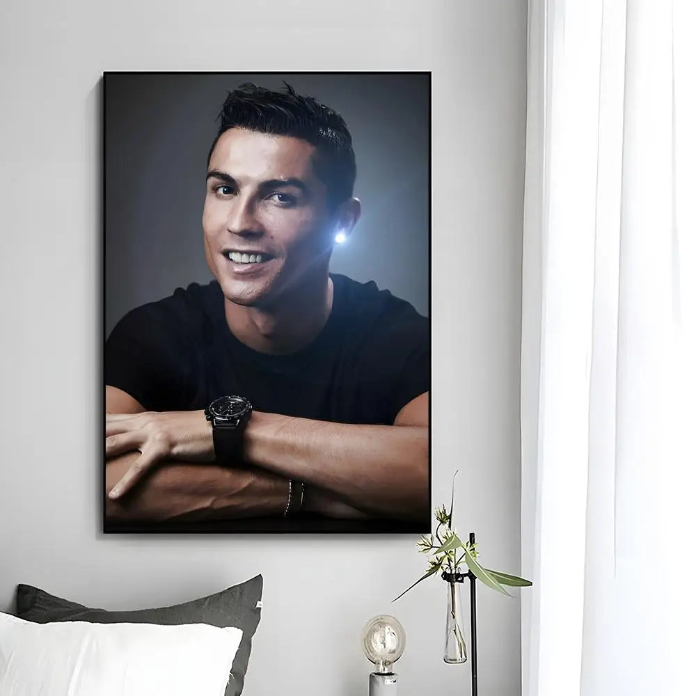 A modern wall art print featuring a portrait of Cristiano Ronaldo with a glowing light effect.