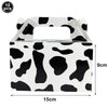 A white cardboard box with a black cow print pattern, used for number foil balloons.
