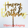 A set of ten gold acrylic happy birthday cake toppers with the words Happy Birthday