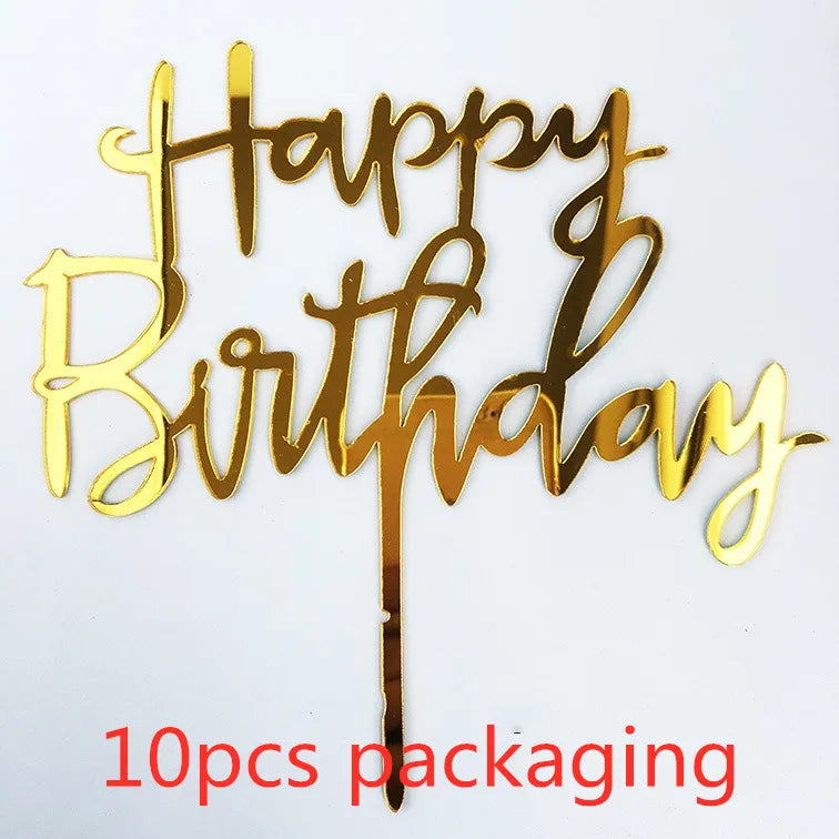 A set of ten gold acrylic happy birthday cake toppers with the words Happy Birthday
