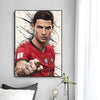 A modern wall art print featuring a close-up portrait of Cristiano Ronaldo in a red jersey with black paint splatters.