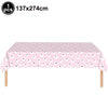 Pink ghost patterned tablecloth for a Halloween party table