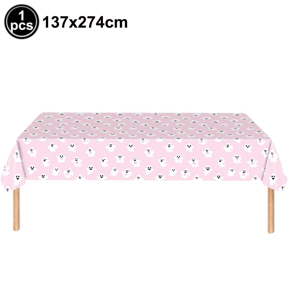 Pink ghost patterned tablecloth for a Halloween party table