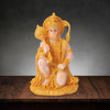 Handcrafted Hanuman resin statue in gold color depicting a figure for meditation and home decor