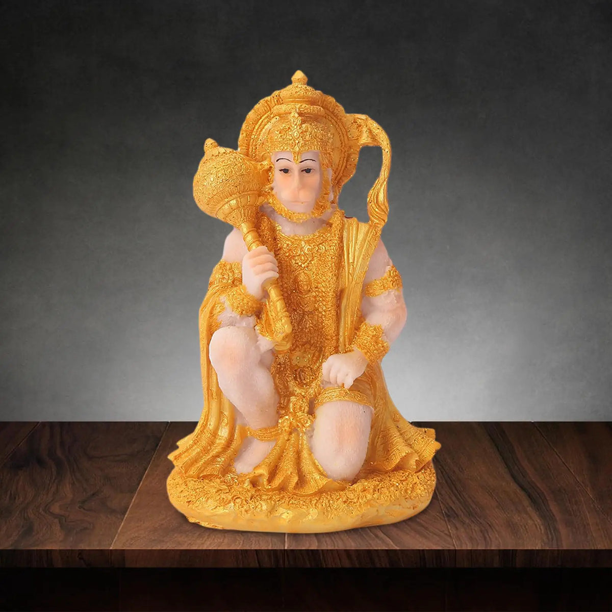 Handcrafted Hanuman resin statue in gold color depicting a figure for meditation and home decor