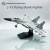 A model of a J-15 Flying Shark Fighter jet built from building blocks displayed on a white surface.