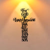 A black iron cross wall art with the quote For God So Loved the world that He gave His only Son, set against a warm, glowing 