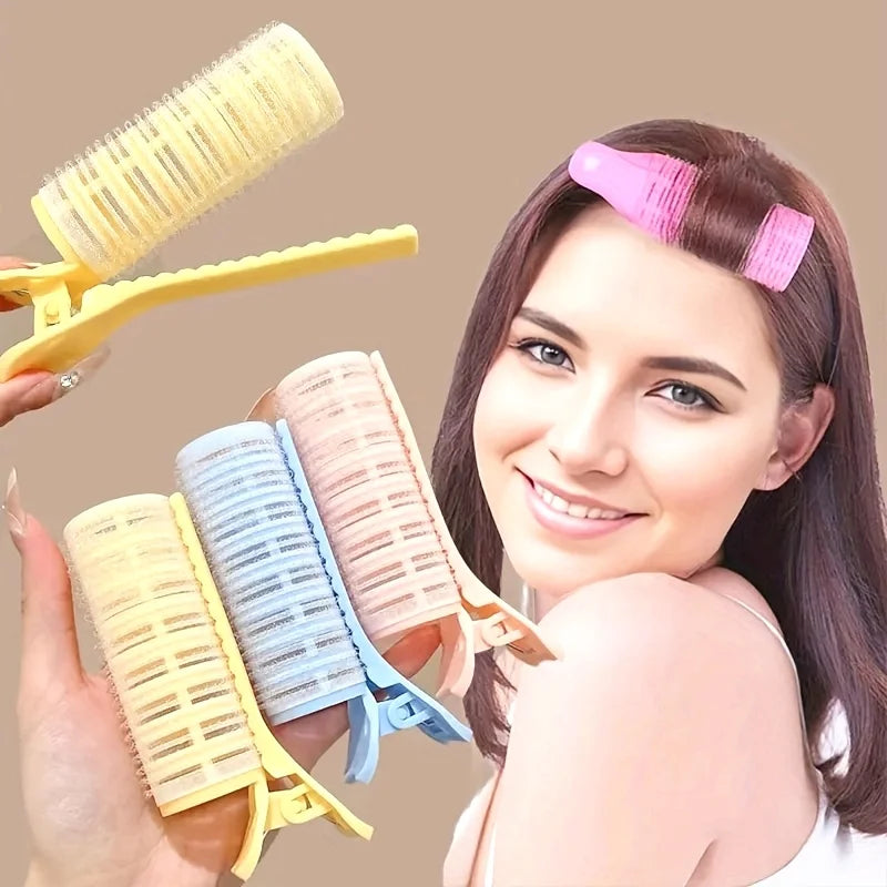 A woman holds several heat-free curling irons in various colors and styles for DIY hair curling.