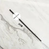 A black metal magic wand replica with a labeled metal core and a 39cm length displayed on a white marble surface.