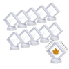 A set of ten white floating shadow box jewelry display frames with clear acrylic panels and white bases.