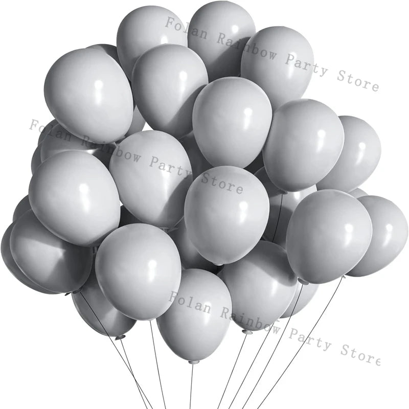 A set of matte latex balloons in pink and blue forming a balloon garland.