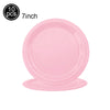 Ten pink disposable paper plates, 7 inches in diameter.