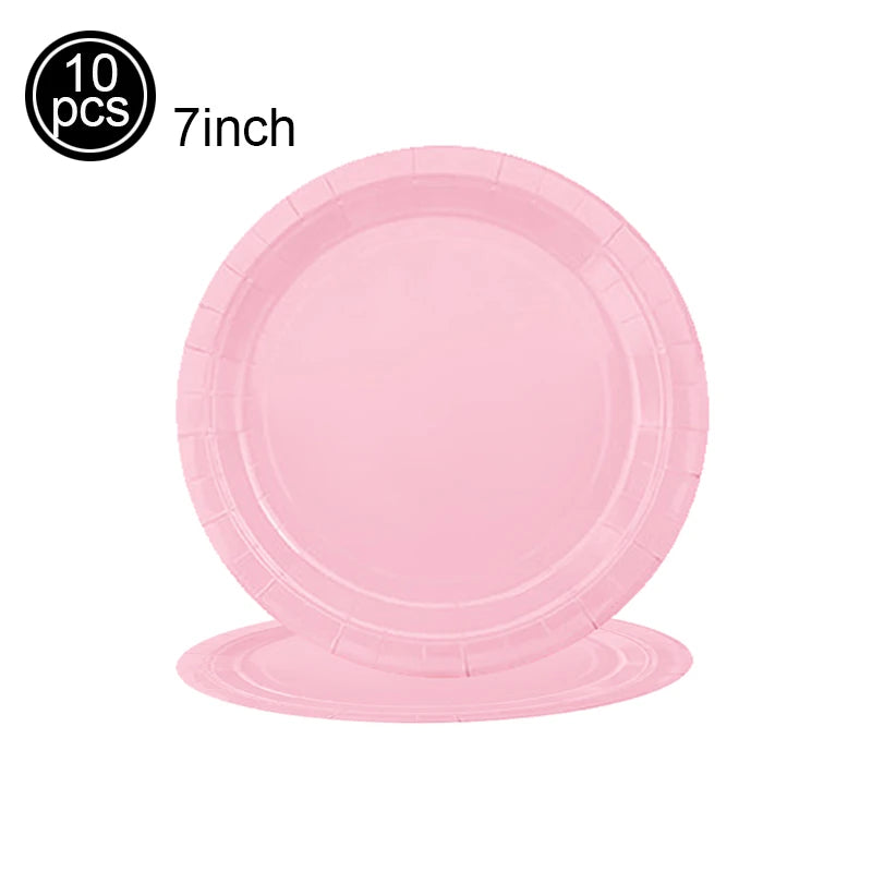 Ten pink disposable paper plates, 7 inches in diameter.