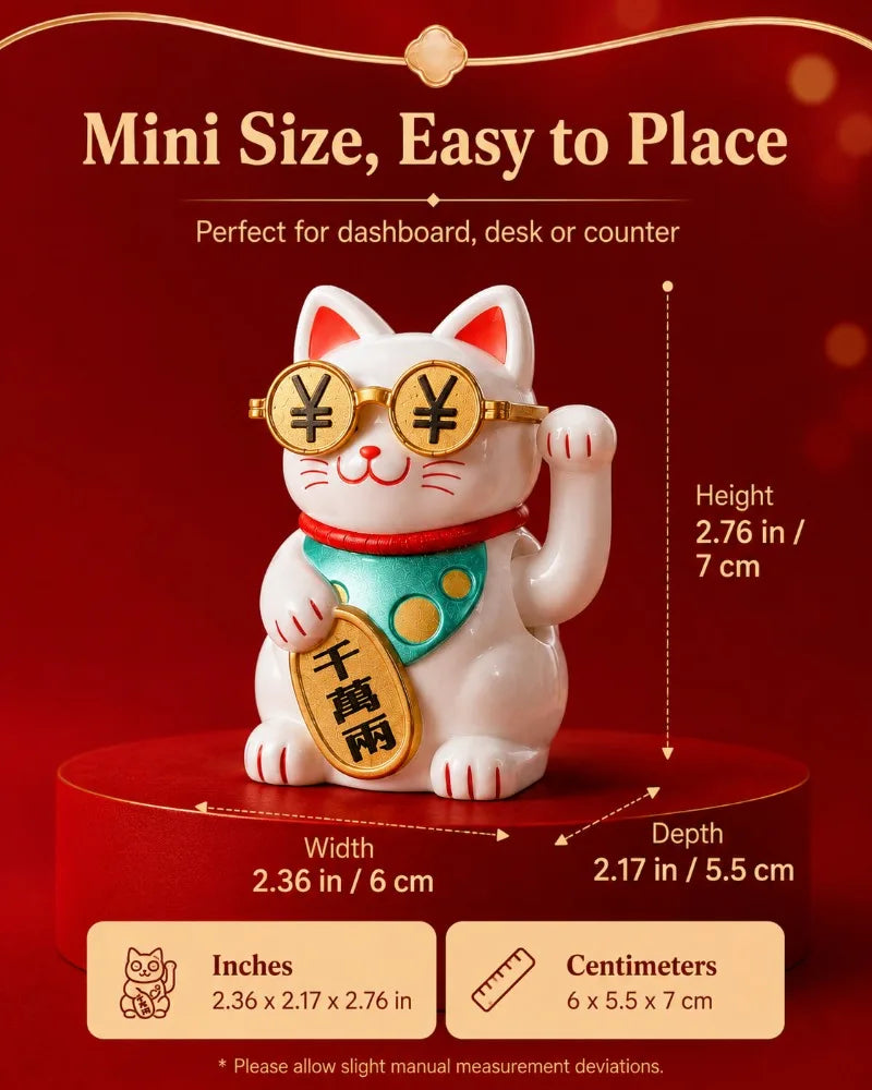 A white ceramic lucky cat ornament with gold-rimmed glasses sitting on a red base.