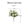 A bouquet of artificial white roses with a green stem and leaves.