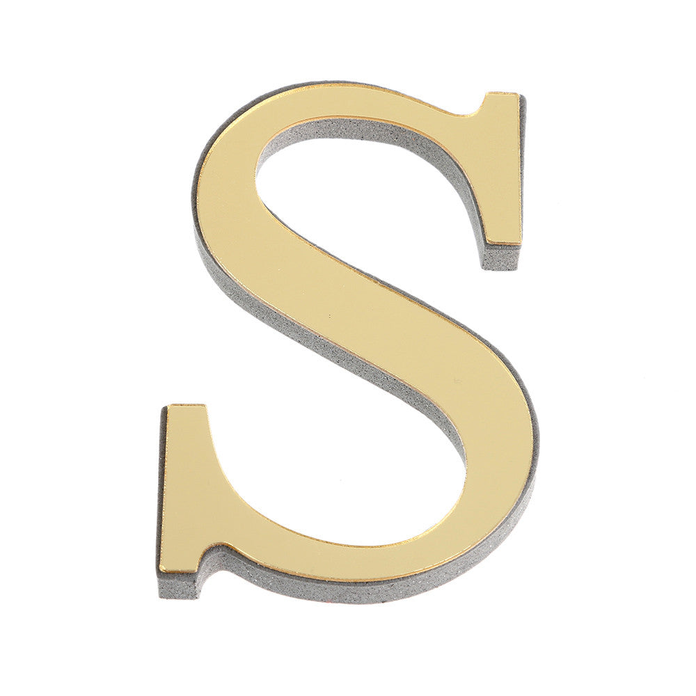 A three-dimensional golden letter S cutout with a silver edge, used as a mirror wall decal.