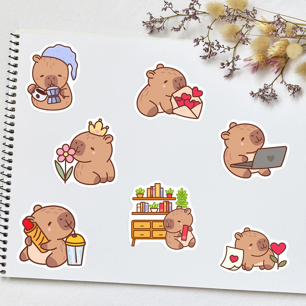 A collection of cute brown bear decals and stickers on a white notepad.