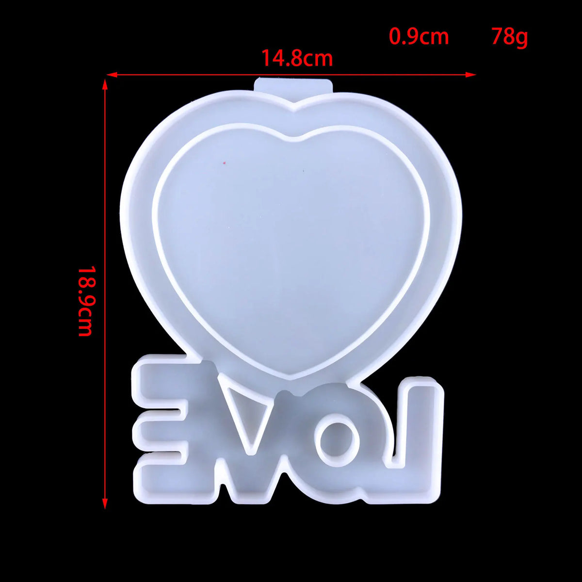 White heart-shaped silicone mold with the letters VOI visible on the bottom