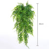A long, cascading artificial ivy vine garland with green leaves shown against a white background.