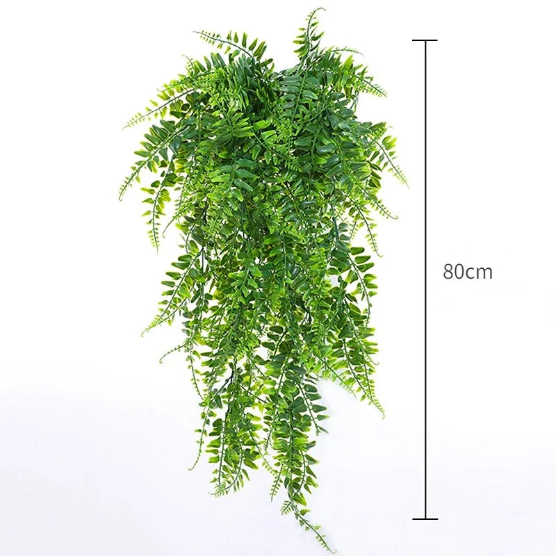 A long, cascading artificial ivy vine garland with green leaves shown against a white background.