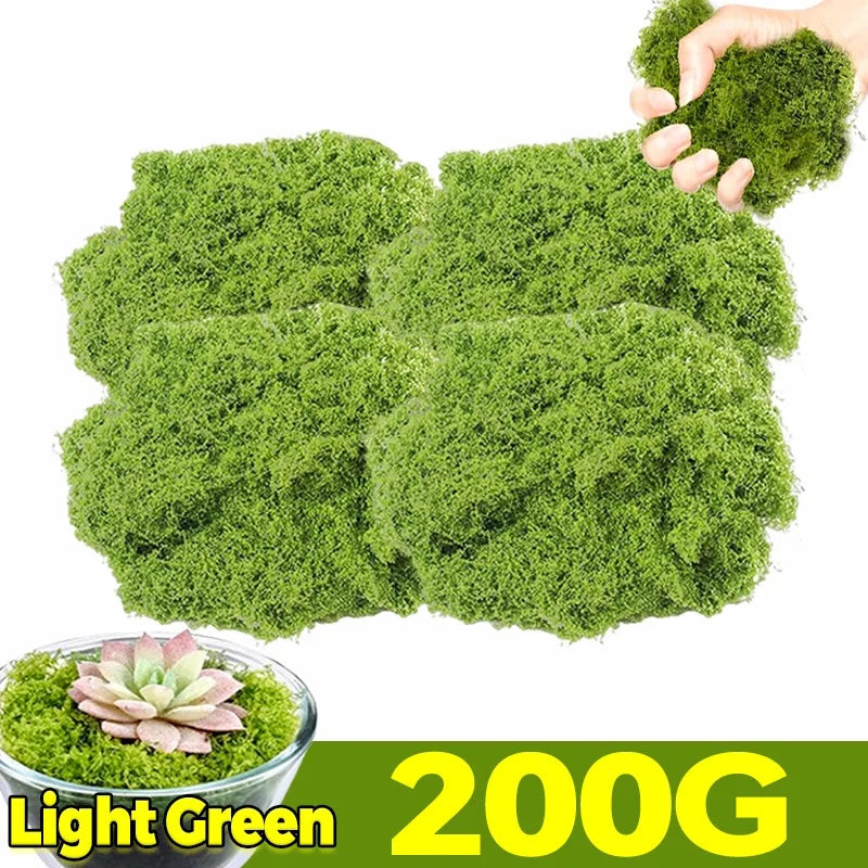 A hand holds a clump of light green artificial moss, with a quantity label indicating 200G.
