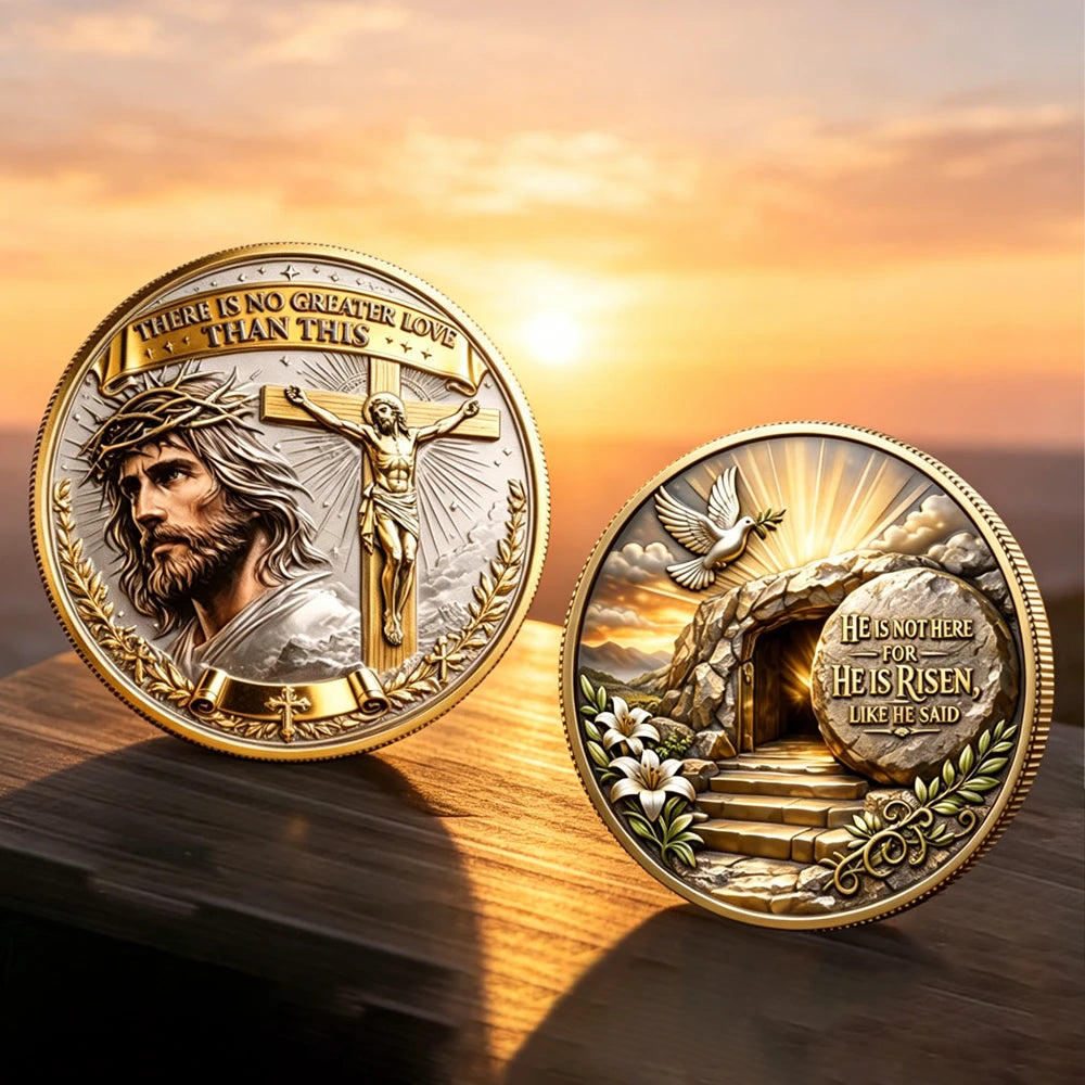 A gold faith challenge coin featuring a depiction of Jesus on the cross and text about greater love.