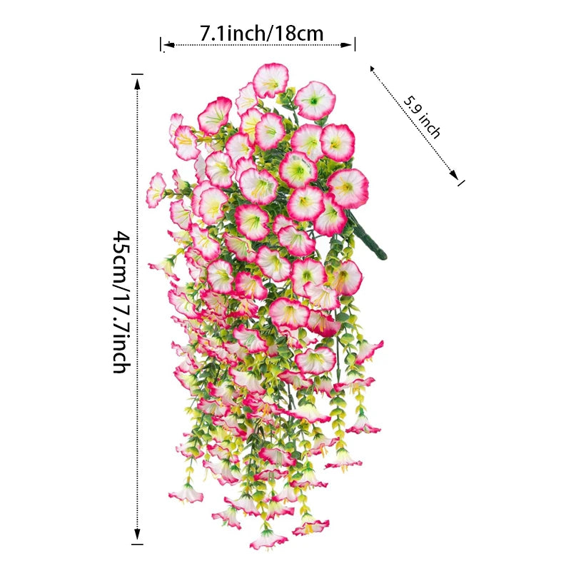 A vertical arrangement of pink and lime green artificial silk morning glory flowers hanging down.